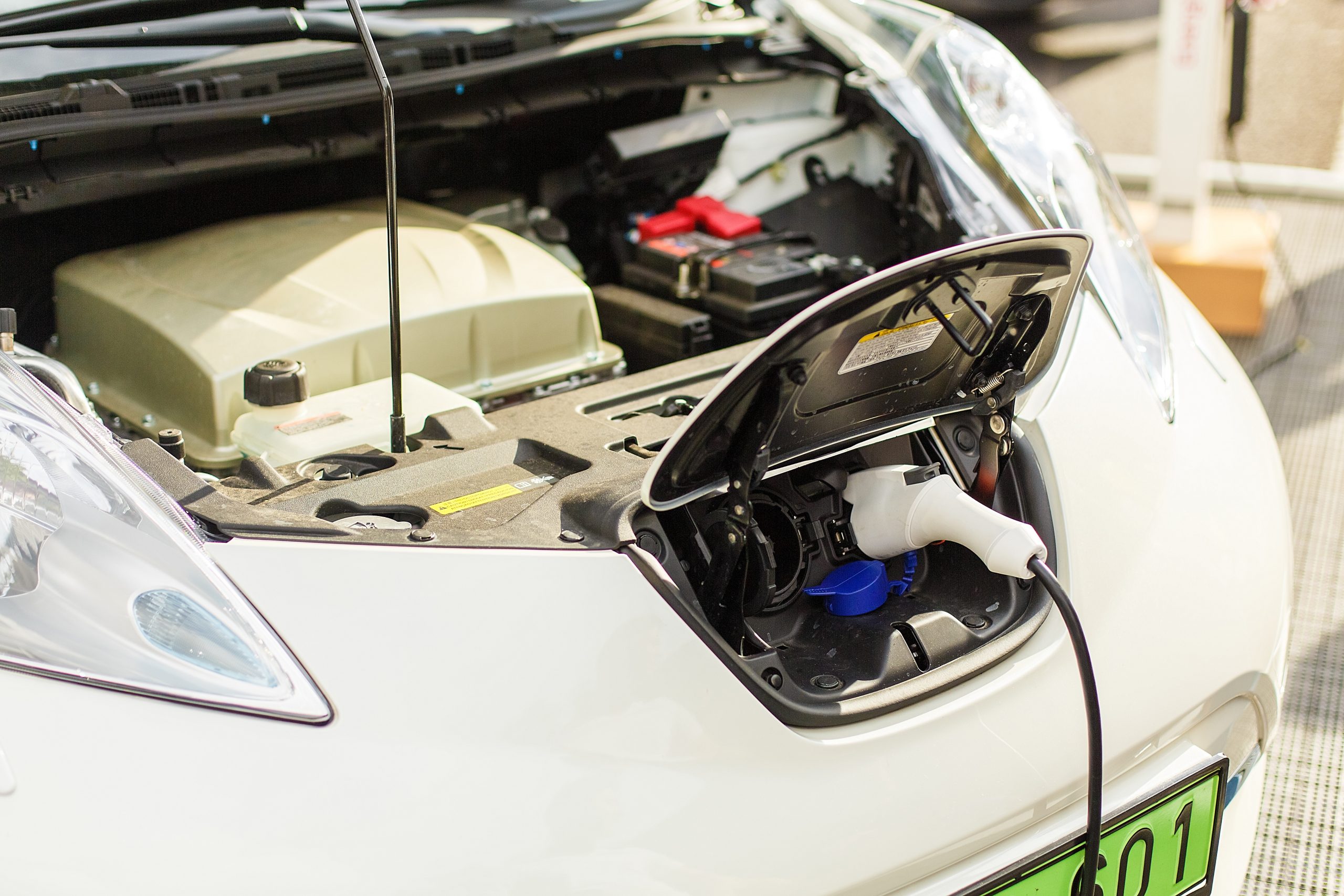 electric-car-in-charging-station-charging-an-elec-2025-01-07-09-48-37-utc